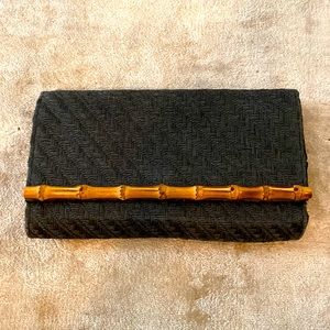 H&M black wicker clutch with bamboo accent